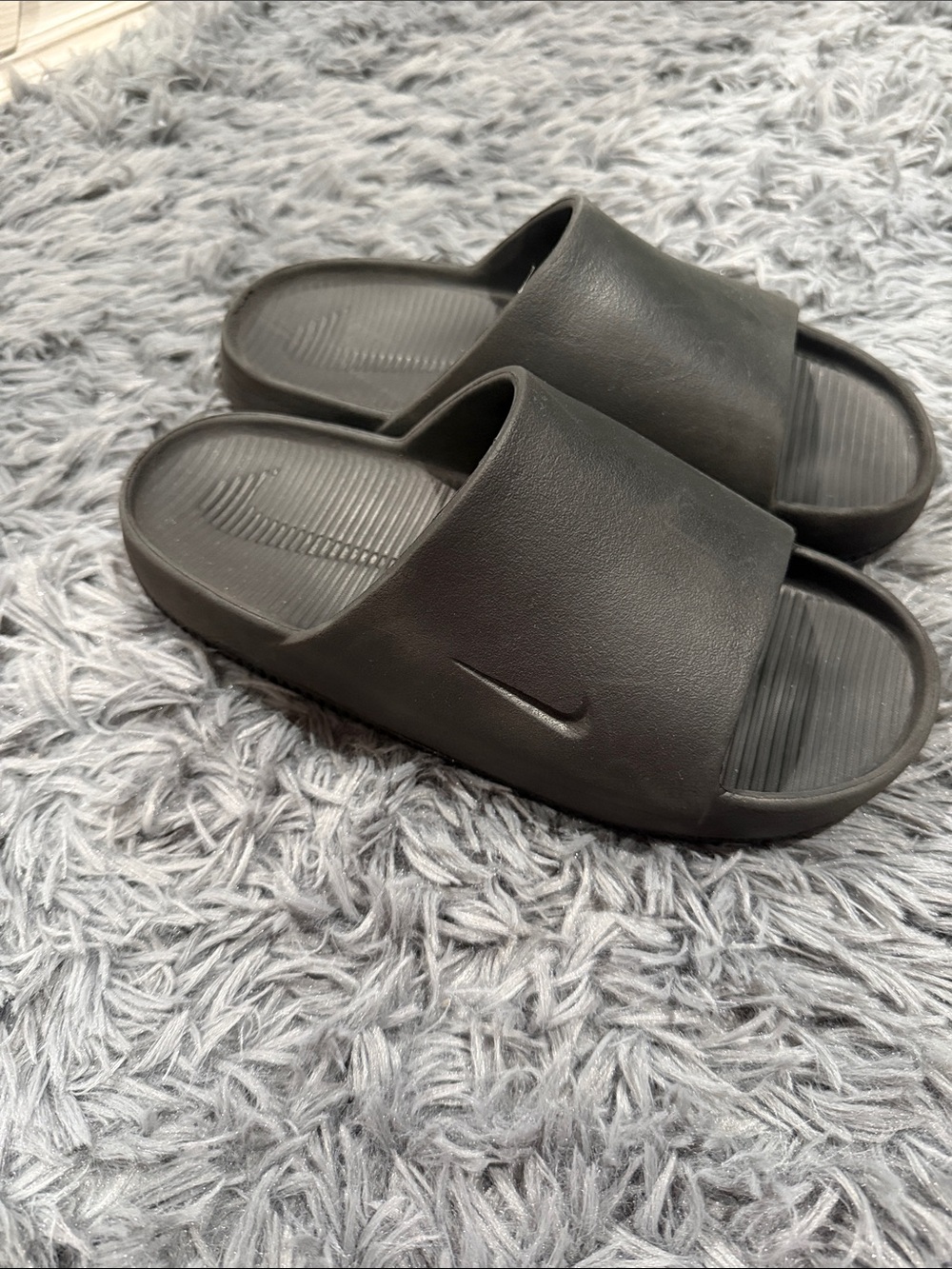 Nike Black Slide Sandals with Debossed Swoosh